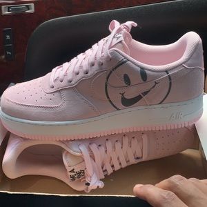 Low pink Air Force 1s